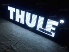 Вывеска "THULE" в мастерской